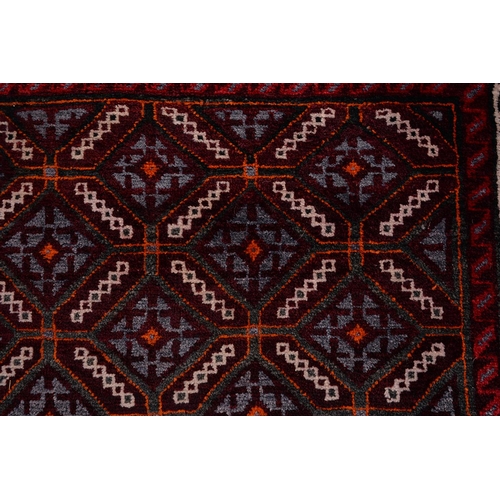 1148 - A Persian Baluch rug, 150 x 117cm