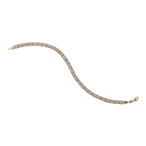 122 - A diamond bracelet, in 9ct gold, 18cm l, 7g