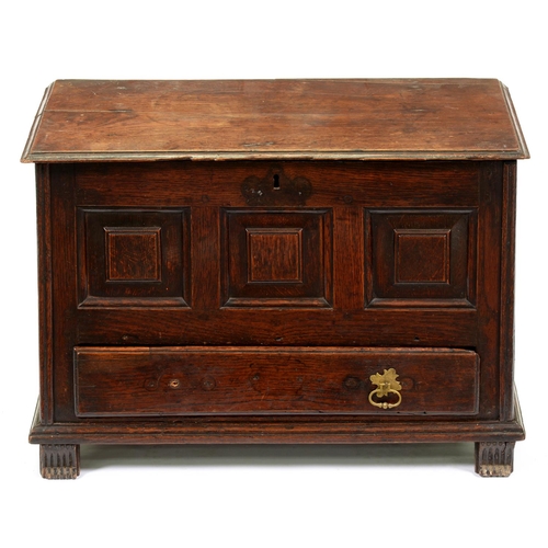 1225 - A George III oak miniature chest, Coffor Bach, with detachable lid and three raised and fielded pane... 