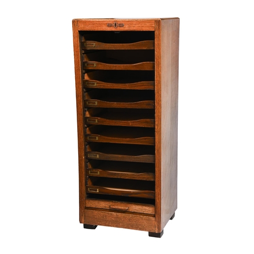 1306 - A 1930s filing cabinet, with tambour shutter, 115cm h; 47 x 38cm