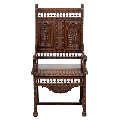 1328 - A Northern European oak and walnut panel back armchair, late 19th c, with spindle galleries, the pan... 