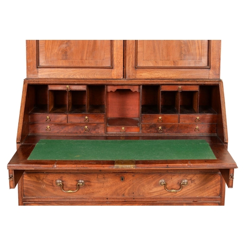 1337 - A George III mahogany bureau bookcase, with open triangular pediment and pear drop frieze, fitted wi... 