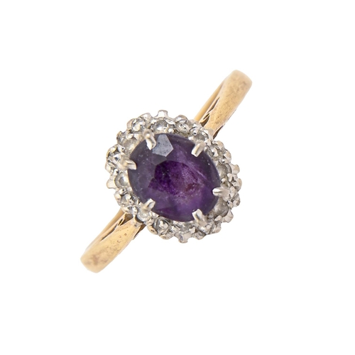 14 - An amethyst and diamond cluster ring, gold hoop, 3.1g, size N