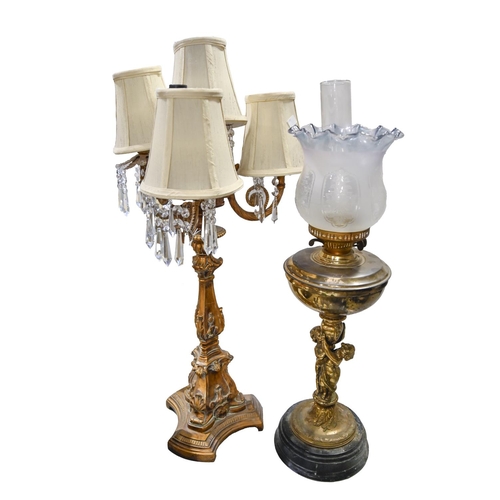 1429 - A gilt-brass and glass figural oil lamp, c. 1900, 74cm h, a four-light table lamp, 20th c, triform b... 