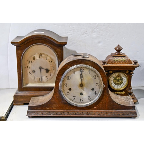 1435 - An oak Napoleon mantel clock, c. 1930, silvered dial with Arabic numerals, 42cm w, another two mante... 