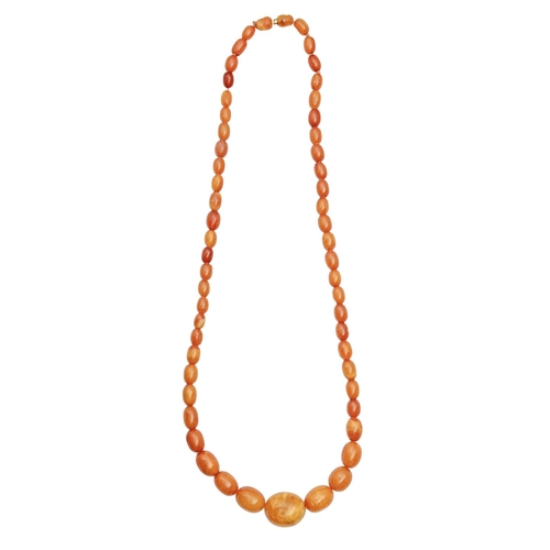 159 - A necklace of amber beads, 52g