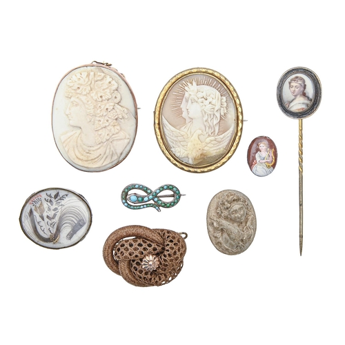 160 - A Victorian hairwork and gold brooch, unmounted lava cameo, two cameo brooches, and a German antler ... 