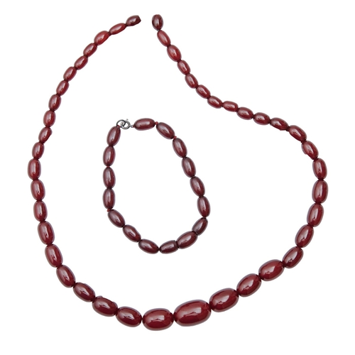 163 - A necklace and a bracelet of faturan beads and a loose bead, 42g