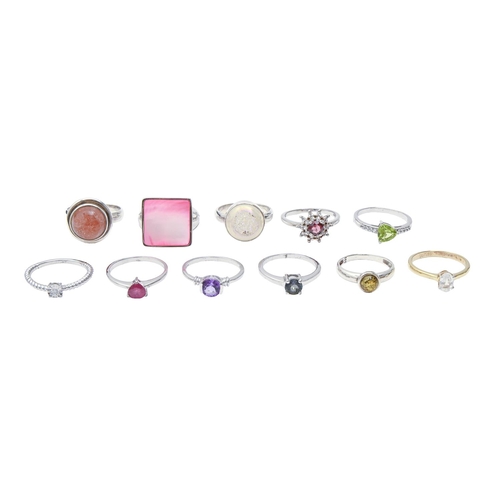 166 - Eleven silver rings, variously gem set, 39.6g, size P, R