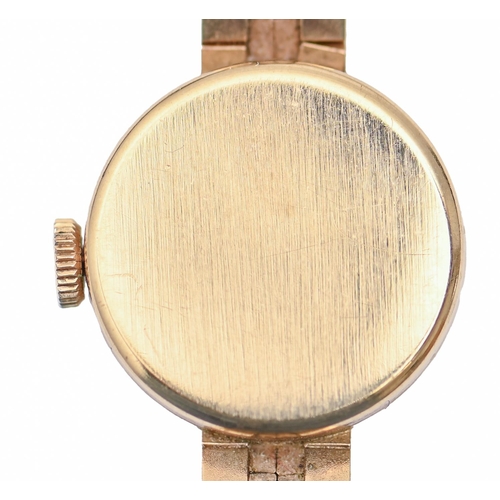 172 - A Giraud-Perregaux 9ct gold lady's wristwatch, 17mm diam, London 1963, on 9ct gold bracelet, 17.4g... 