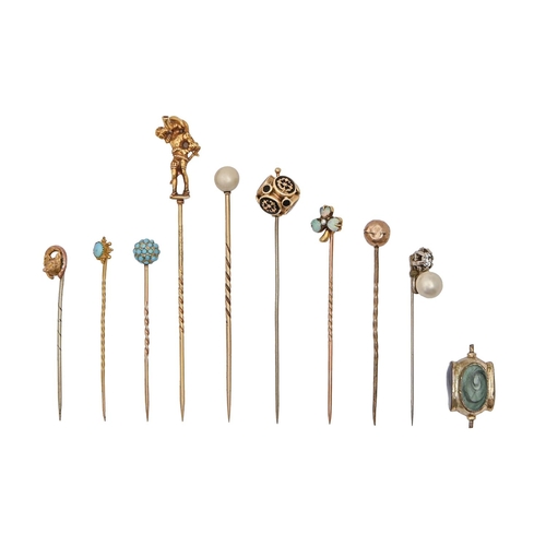 188A - A gold stickpin with Robin Hood figural terminal, another with opal and pearl clover leaf terminal, ... 