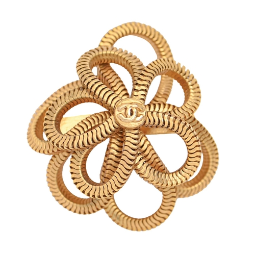 199 - Costume jewellery. A Chanel giltmetal flexible flower brooch, approximately 45mm maker's mark and MA... 