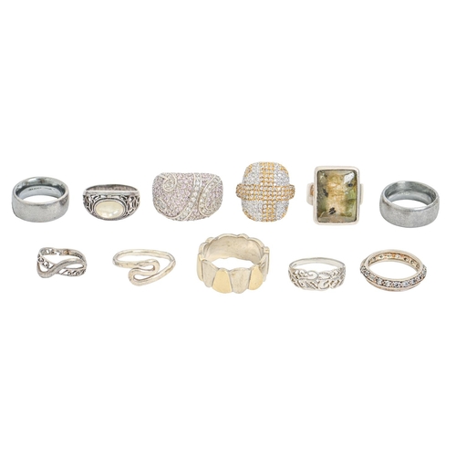 208 - Eleven silver rings, several gem set, 84g, various sizes