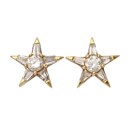 30 - A pair of star shaped diamond ear studs, in 18ct gold, star 9mm, 2.1g
