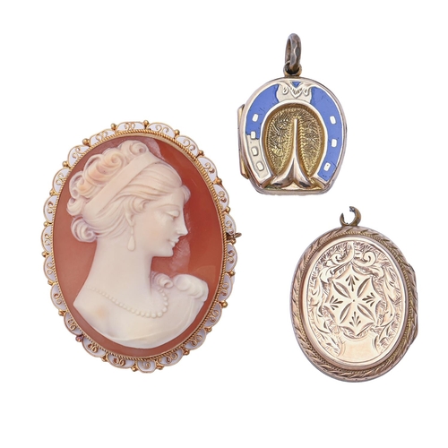 34 - A Victorian gold and enamel horseshoe locket, c1900, 19mm, another locket and a cameo brooch, the go... 