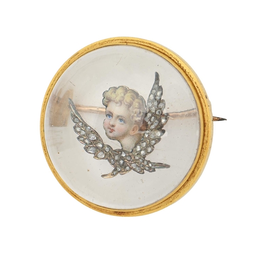 41 - A Victorian diamond, reverse painted  crystal intaglio and gold brooch, painted with the head of a c... 
