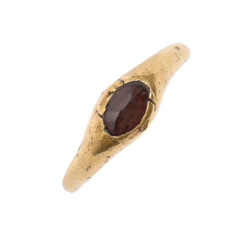 49 - A medieval gold ring, c1200-1450, set with a garnet, 2.8g, size J, PAS record ID: ESS-6B7646  Found ... 