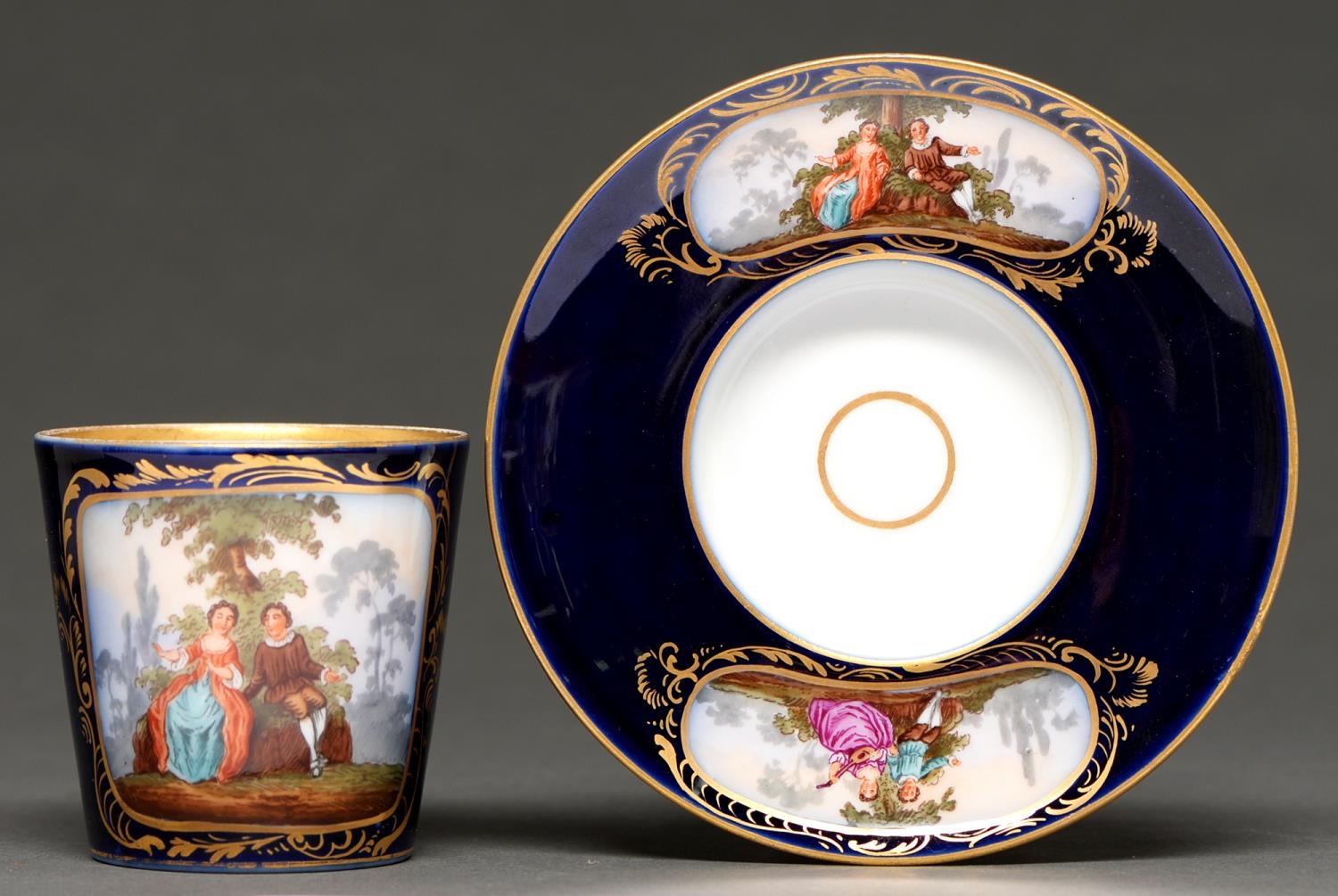 A German porcelain trembleuse cup and saucer, late 19th / early 20th c ...