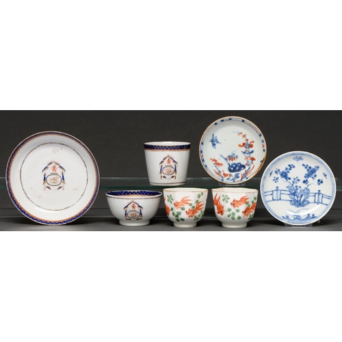 586 - A Chinese export porcelain armorial trio, c1790, enamelled with a crest, initials and blue and gilt ... 