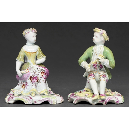 589 - A pair of Longton Hall figures of a seated boy and girl, 'Spring' and 'Summer', c1758-1760, in pale ... 