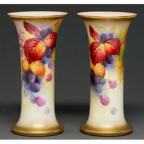 593 - A pair of Royal Worcester spill vases, 1938, painted by K Blake, both signed, with blackberries and ... 