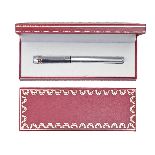 659 - A Le Must de Cartier silver plated and gold plated reeded fountain pen, maker's booklet and box... 