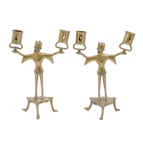 719 - A pair of cast brass figural candelabra, on three legs, 22cm h