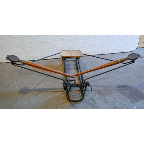 1397 - A vintage rowing machine, early 20th c, the frame 94cm l