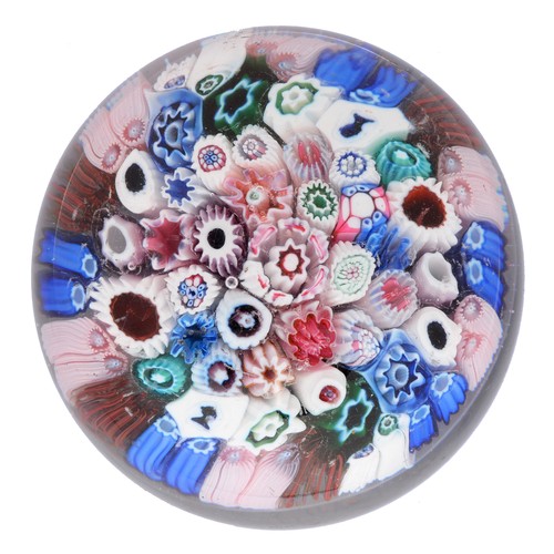 590 - A Bacchus close-packed millefiori paperweight, c1850, including silhouette canes of, possibly, Queen... 