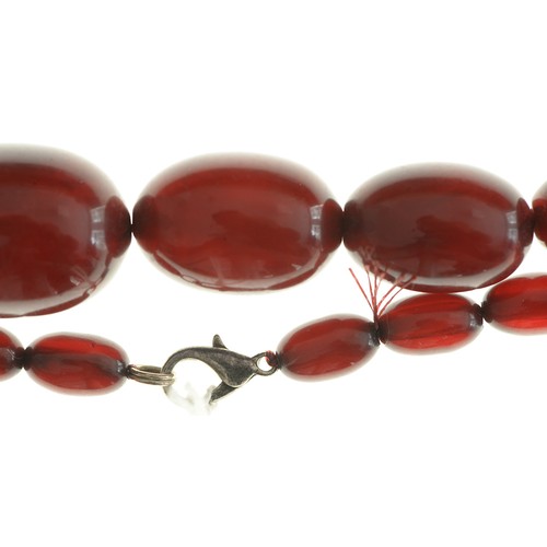 164 - A necklace of faturan beads, 53g