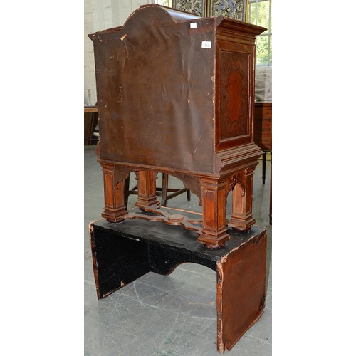 1212 - A Spanish tooled leather writing cabinet, c1920, with breakarched pediment and fitted interior with ... 