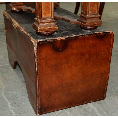 1212 - A Spanish tooled leather writing cabinet, c1920, with breakarched pediment and fitted interior with ... 