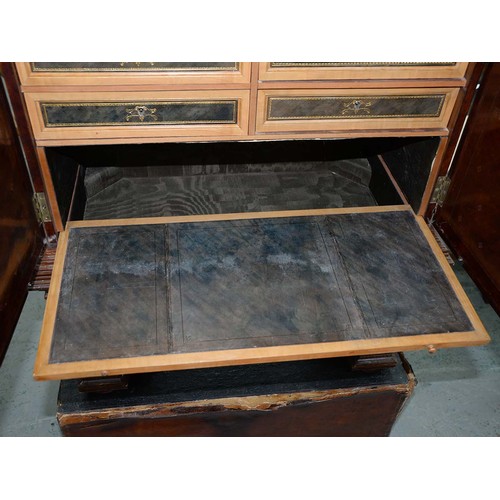 1212 - A Spanish tooled leather writing cabinet, c1920, with breakarched pediment and fitted interior with ... 