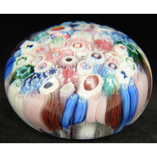 590 - A Bacchus close-packed millefiori paperweight, c1850, including silhouette canes of, possibly, Queen... 