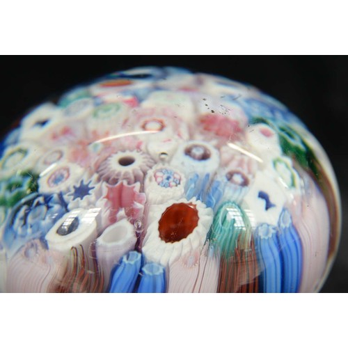 590 - A Bacchus close-packed millefiori paperweight, c1850, including silhouette canes of, possibly, Queen... 