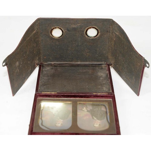 708 - Victorian photography. Two folding stereoscopes, c1853, one of maroon morocco designed by W E Kilbur... 