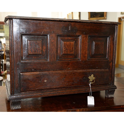 1225 - A George III oak miniature chest, Coffor Bach, with detachable lid and three raised and fielded pane... 