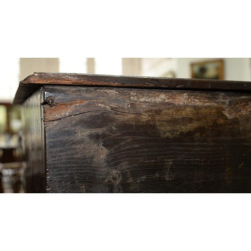 1225 - A George III oak miniature chest, Coffor Bach, with detachable lid and three raised and fielded pane... 