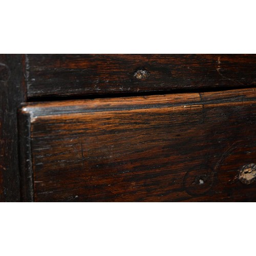 1225 - A George III oak miniature chest, Coffor Bach, with detachable lid and three raised and fielded pane... 