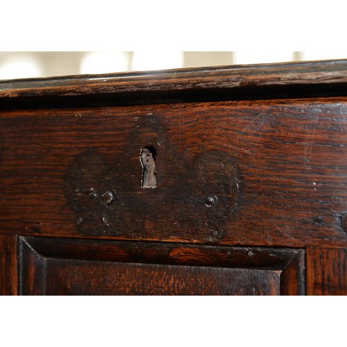 1225 - A George III oak miniature chest, Coffor Bach, with detachable lid and three raised and fielded pane... 