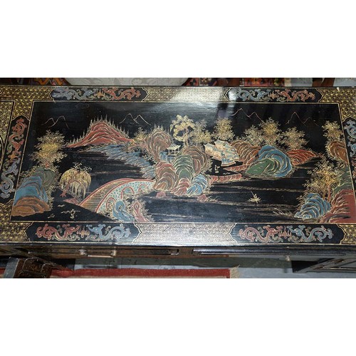 1239 - A South East Asian chinoiserie lacquered low table, late 20th c, fitted with drawers and doors, 50cm... 