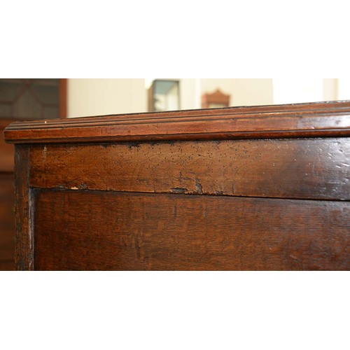 1340 - A Queen Anne walnut and oak chest of drawers, with brass axe head handles, on bracket feet, 87cm h; ... 