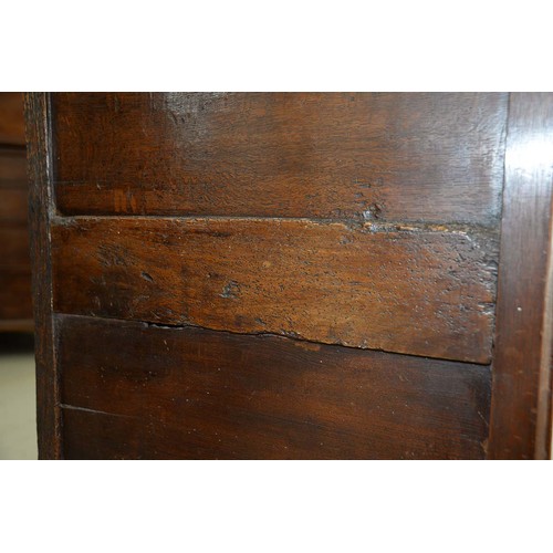 1340 - A Queen Anne walnut and oak chest of drawers, with brass axe head handles, on bracket feet, 87cm h; ... 