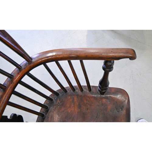 1341 - An early 19th c yew and elm wood Windsor chair, North Nottinghamshire, on turned legs with crinoline... 