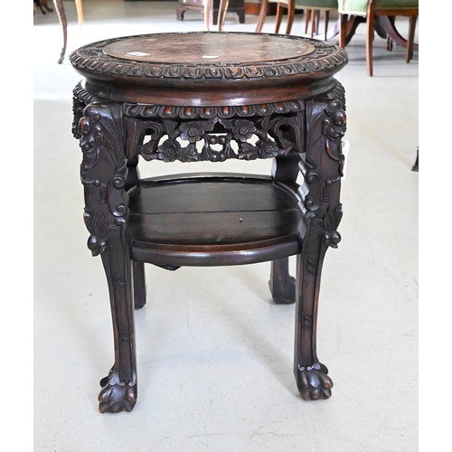 1342 - A Chinese carved hardwood stand, inset marble top and detailed frieze carving, 59cm h; 43cm diam... 