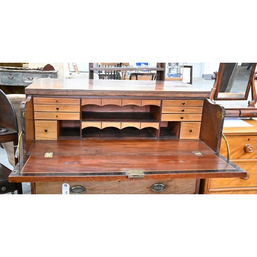 1269 - A George IV mahogany and line inlaid secretaire chest of drawers, with fitted and lightwood veneered... 