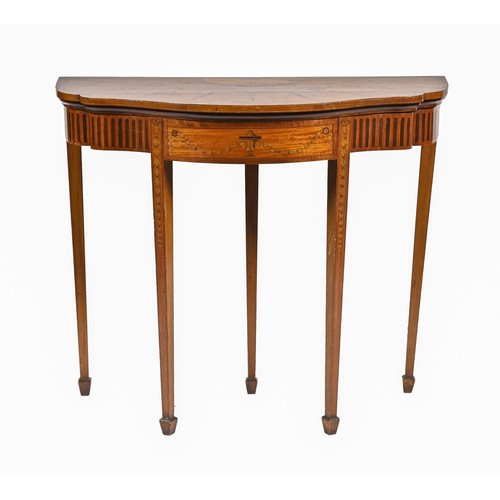 1020 - A satinwood and inlaid card table, early 20th c, in neo classical style, on five square tapered legs... 