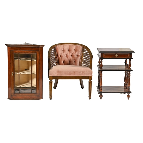 1002 - A caned beech bergere, second quarter 20th c, a mahogany hanging corner cabinet and a French mahogan... 