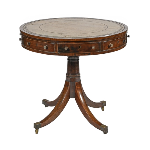 1007 - A George III mahogany drum table, with tooled green leather inlet top and fitted with drawers and op... 