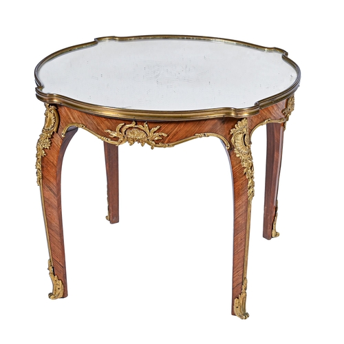 1015 - A French ormolu mounted kingwood table, 20th c, in Louis XV style, with chiselled mounts,  mirror to... 